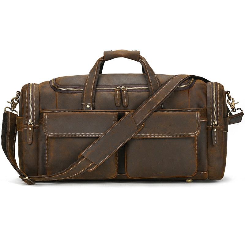 Men's leather duffle bag with multiple pockets in dark brown color, perfect for travel and outdoor adventures.