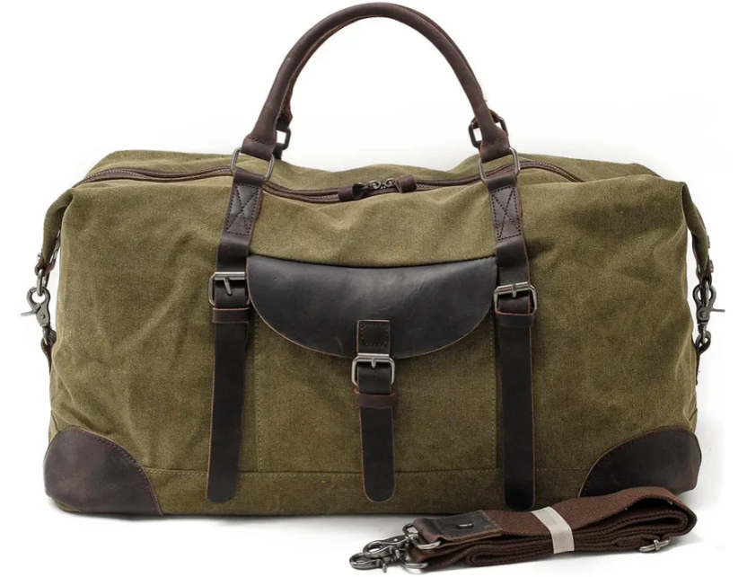Canvas Overnight Bag in olive green with leather accents and adjustable strap for travel and outdoor adventures.