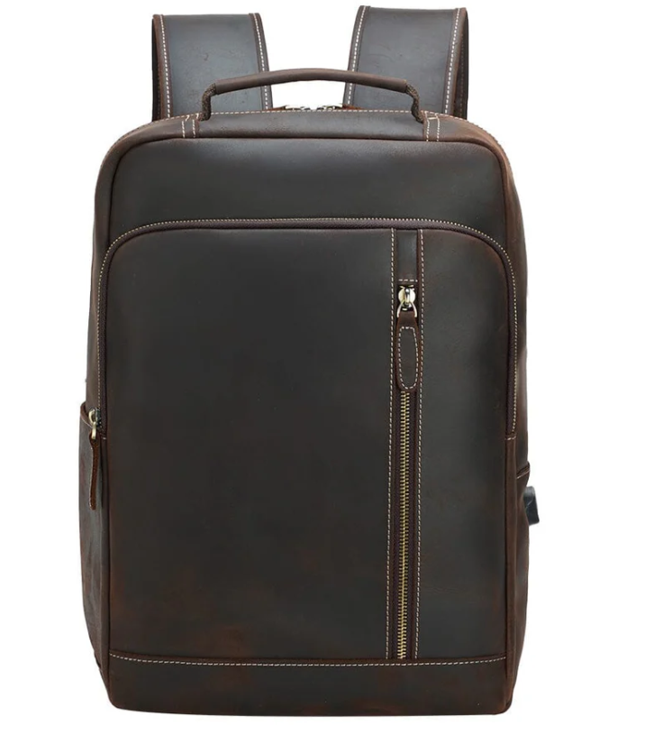 Crazy Horse leather backpack in dark brown, featuring a sleek design and a zippered pocket for convenience.