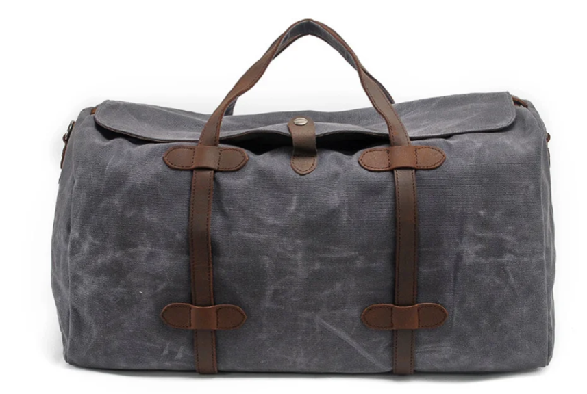 Gym Duffle Bag Sahara in grey canvas with brown leather straps, perfect for workouts and travel.