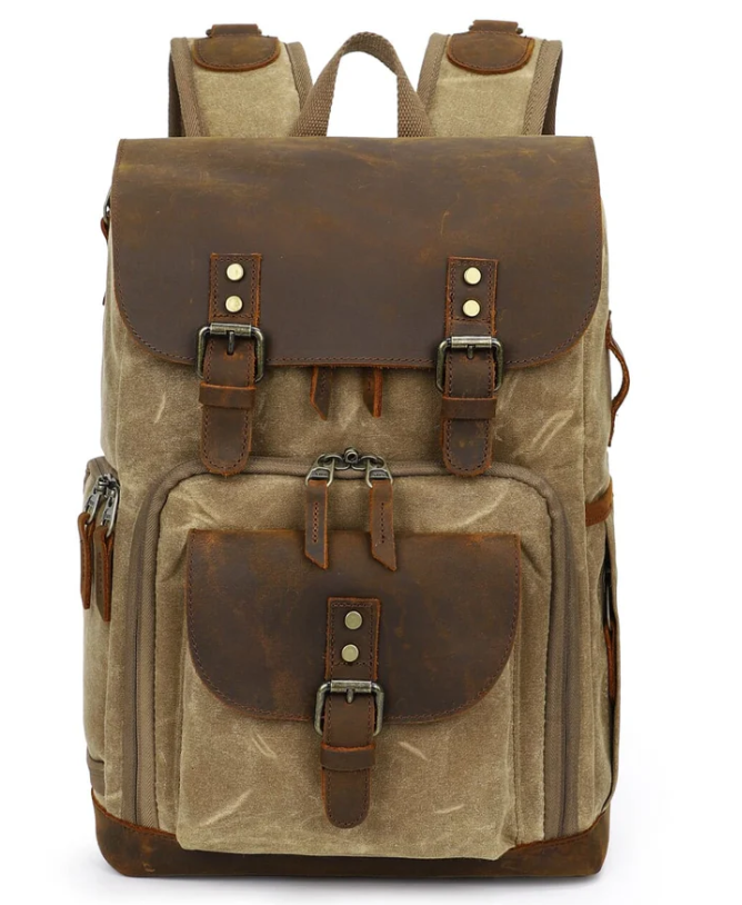 Vintage leather camera backpack from Mount Cook with multiple pockets and durable design for photographers.