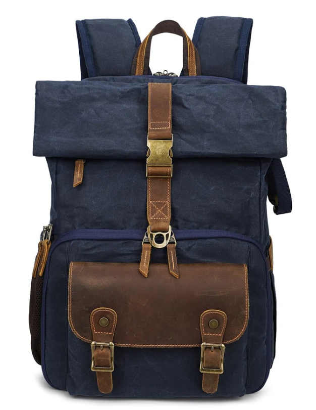 Vintage style camera backpack by Grand Teton in navy blue with leather accents.