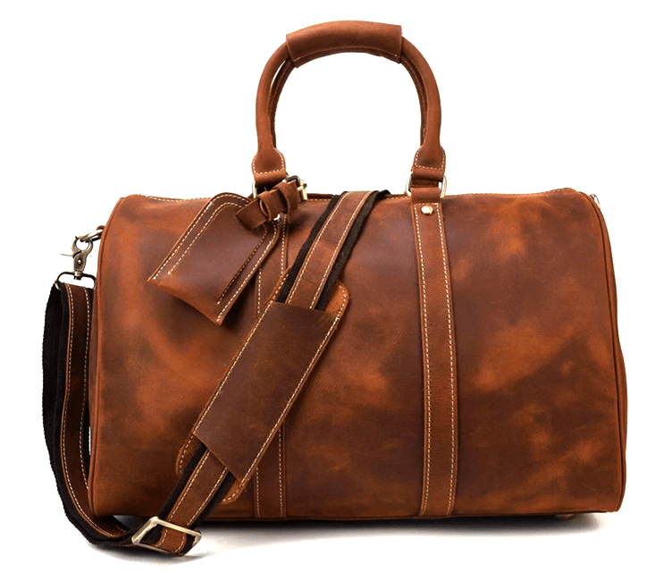 Elegant leather duffle bag in rich brown, featuring sturdy handles and an adjustable shoulder strap, perfect for travel.