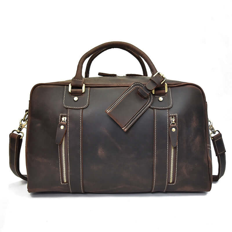 Stylish leather overnight bag in brown, perfect for travel or weekend getaways with multiple pockets.