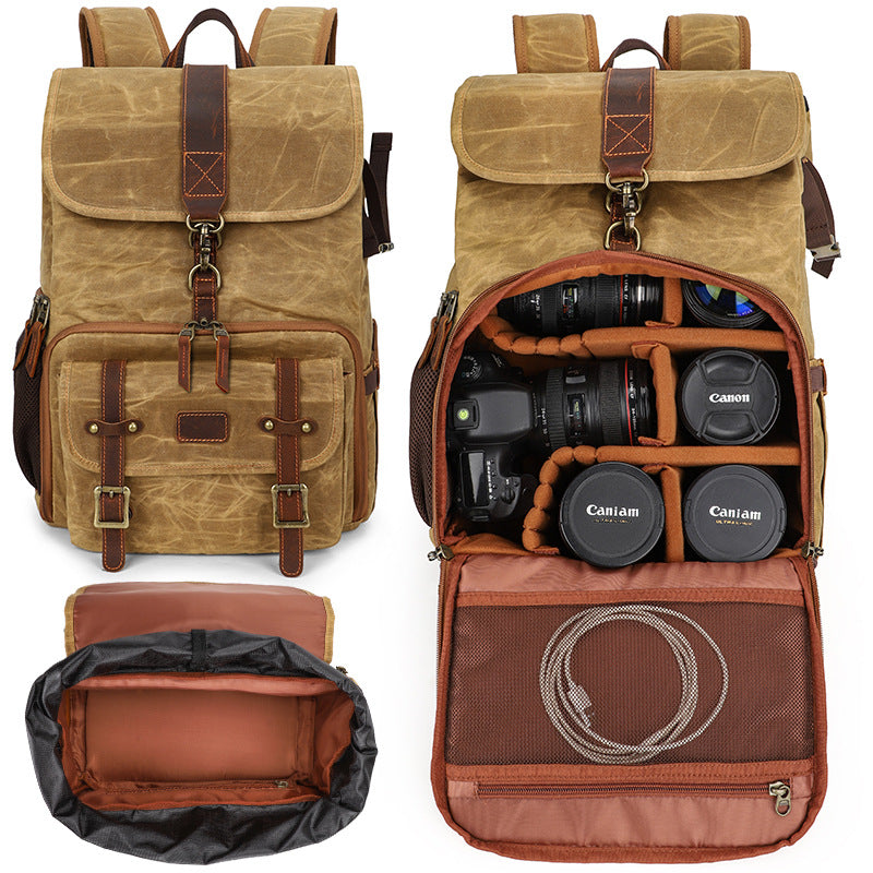 Canvas camera backpack by Kruger featuring multiple compartments for camera gear and equipment.