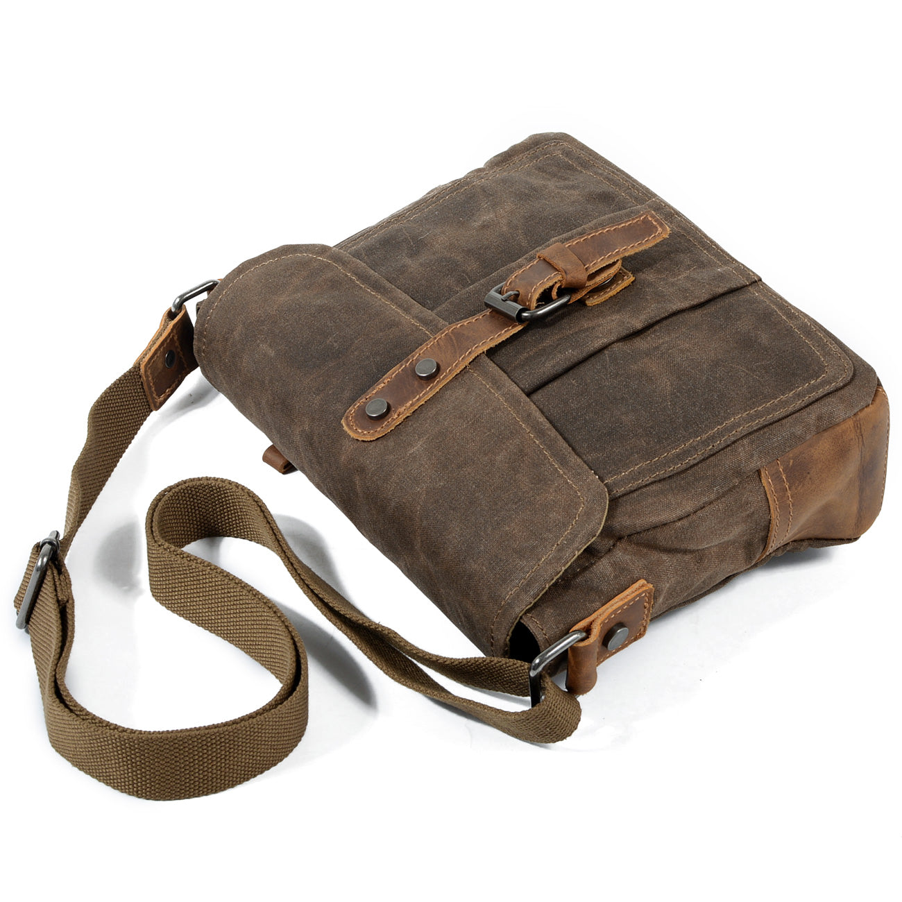 Small Canvas Messenger Bag Pyrenees in brown with adjustable strap and front buckle.