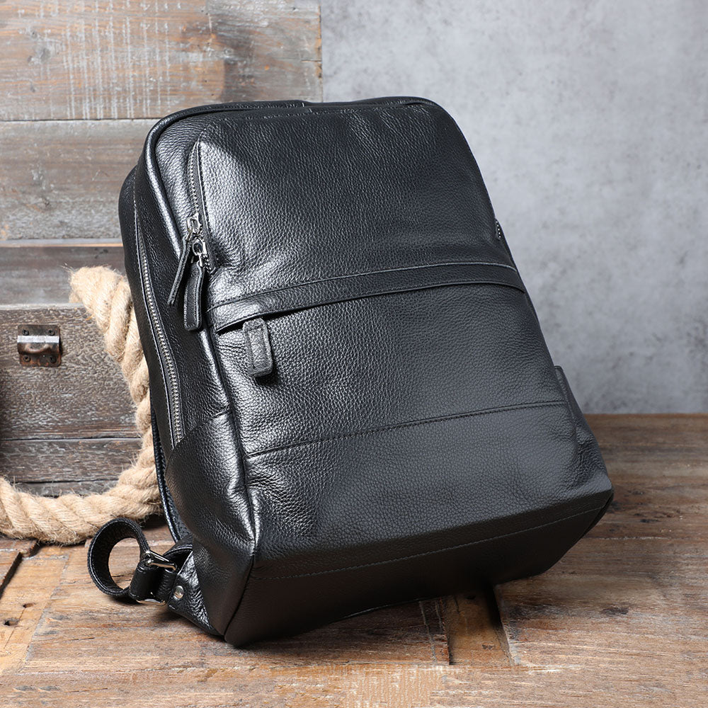 Stylish black leather bookbag from Death Valley, featuring durable material and multiple compartments.