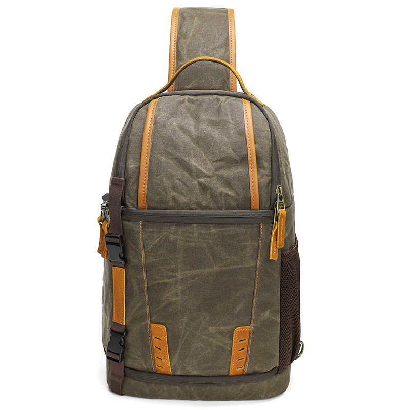 Canvas Camera Sling Bag with leather accents for stylish photography adventures, ideal for travel or outdoor use.