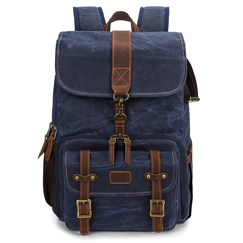 Canvas camera backpack by Kruger featuring a rugged design and stylish leather accents, perfect for photographers.