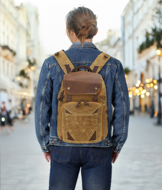 Vintage camera backpack in Sierra Nevada style worn by a person in a casual setting, showcasing its unique design.