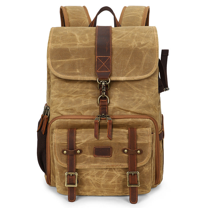 Canvas camera backpack by Kruger, featuring durable material and multiple pockets for gear storage.