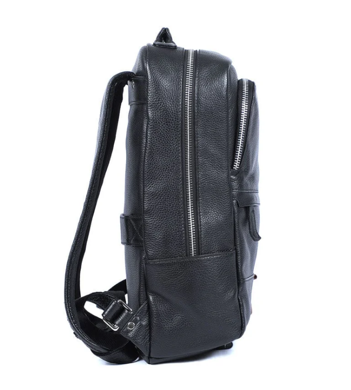 Black leather bookbag from Death Valley featuring a side view with a zipper and adjustable strap.