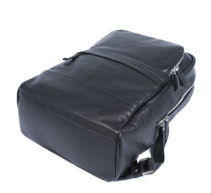 Black leather bookbag from Death Valley, featuring multiple compartments and a sleek design.