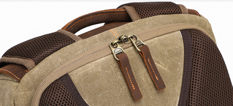 Close-up of Mount Aoraki camera backpack showing sturdy zippers and breathable mesh straps.