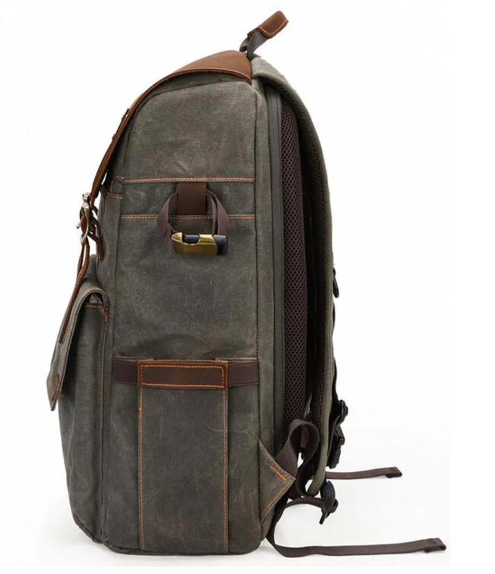Side view of Mount Aoraki camera backpack featuring durable material and stylish leather accents.