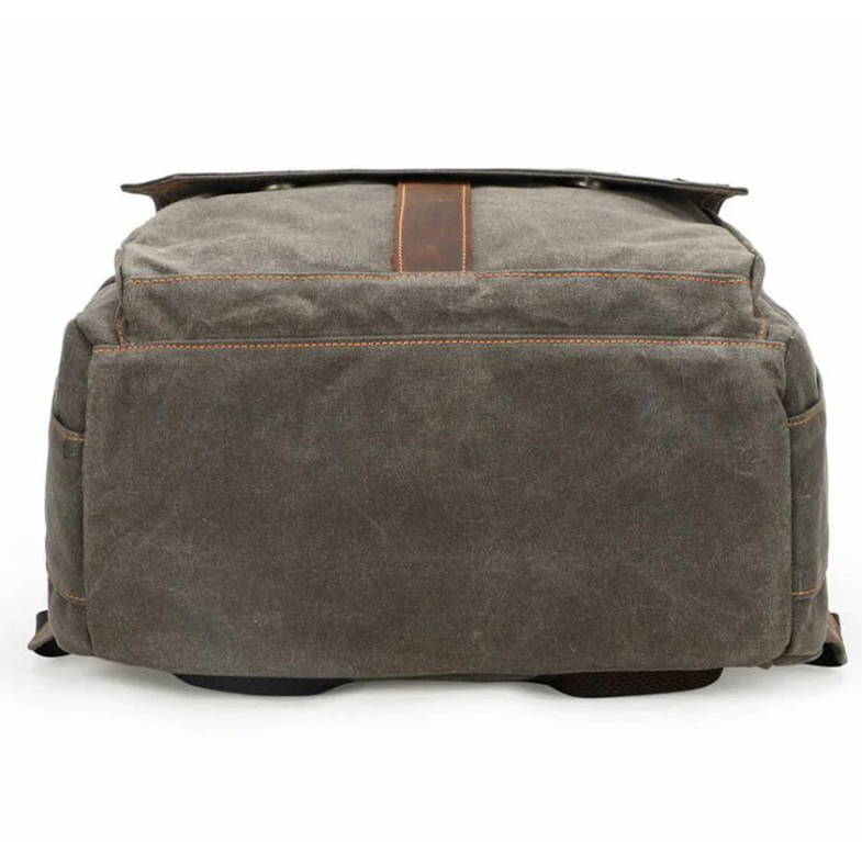 Rustic camera backpack from Mount Aoraki, showcasing a durable design with leather accents.