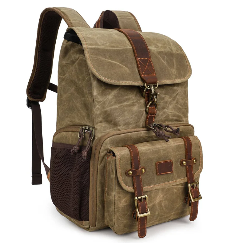 Stylish canvas camera backpack by Kruger with multiple compartments and durable design, perfect for photographers.