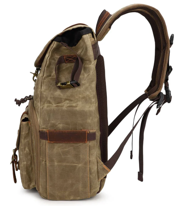 Canvas Camera Backpack in olive green, featuring adjustable straps and multiple pockets for photographers on the go.