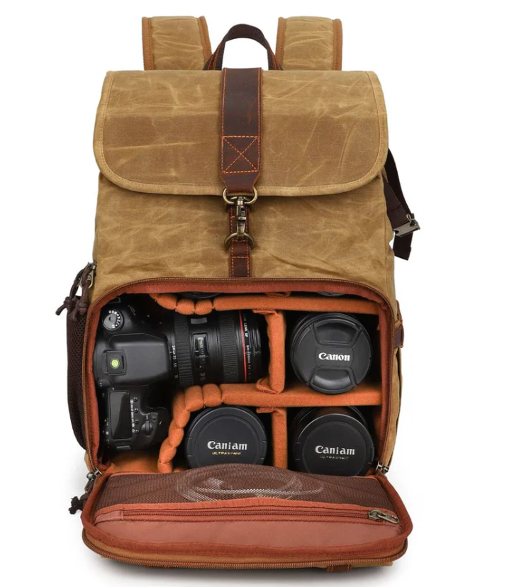 Canvas camera backpack by Kruger, featuring padded compartments for camera and lenses.