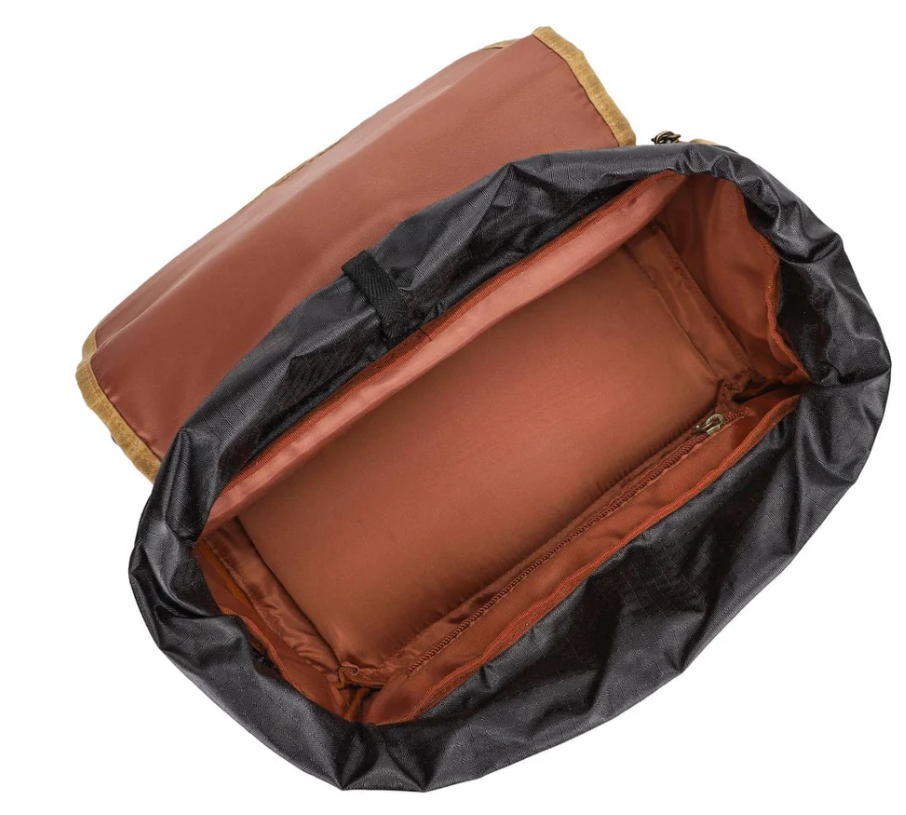 Interior view of the Canvas Camera Backpack by Kruger, featuring a spacious compartment and durable fabric.