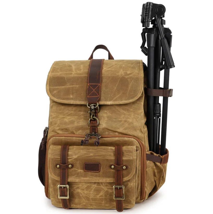 Canvas camera backpack by Kruger in khaki with adjustable straps and side tripod holder.