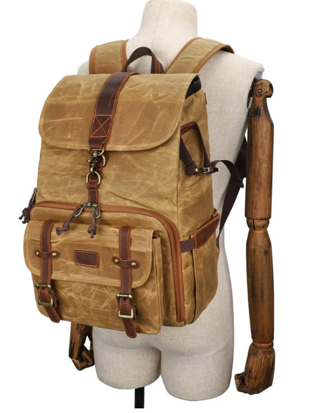 Canvas Camera Backpack by Kruger featuring leather accents, stylish design, perfect for photography gear.