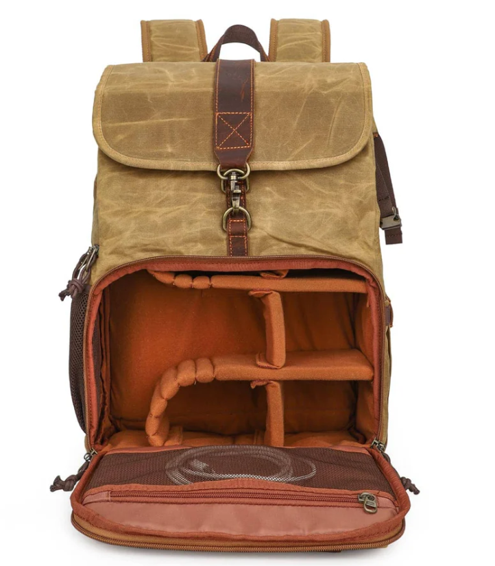 Canvas camera backpack by Kruger, featuring a spacious interior with padded compartments for camera gear.