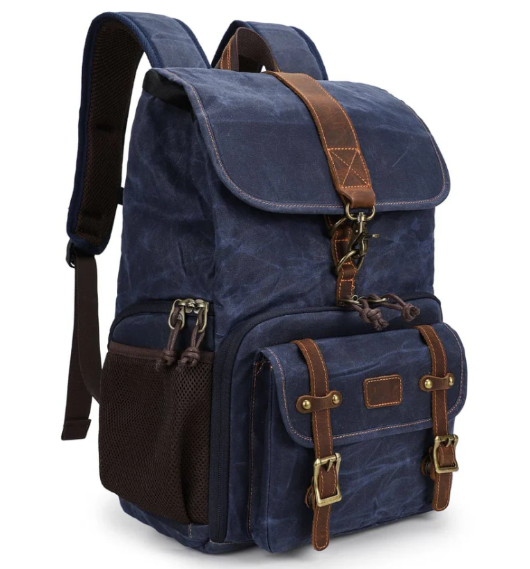 Canvas camera backpack by Kruger featuring a stylish navy blue design with multiple pockets for photography gear.
