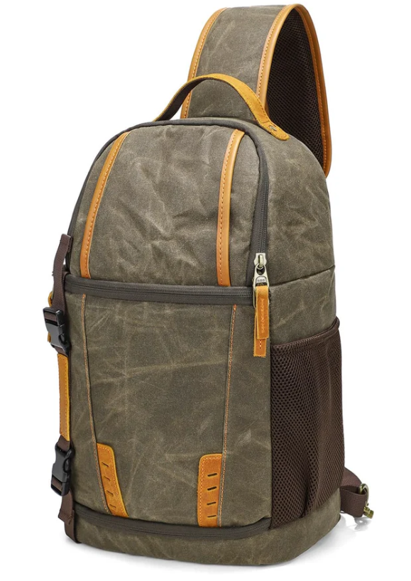 Canvas camera sling bag in khaki with brown accents, perfect for adventure photography and hiking. Named Machu Picchu.