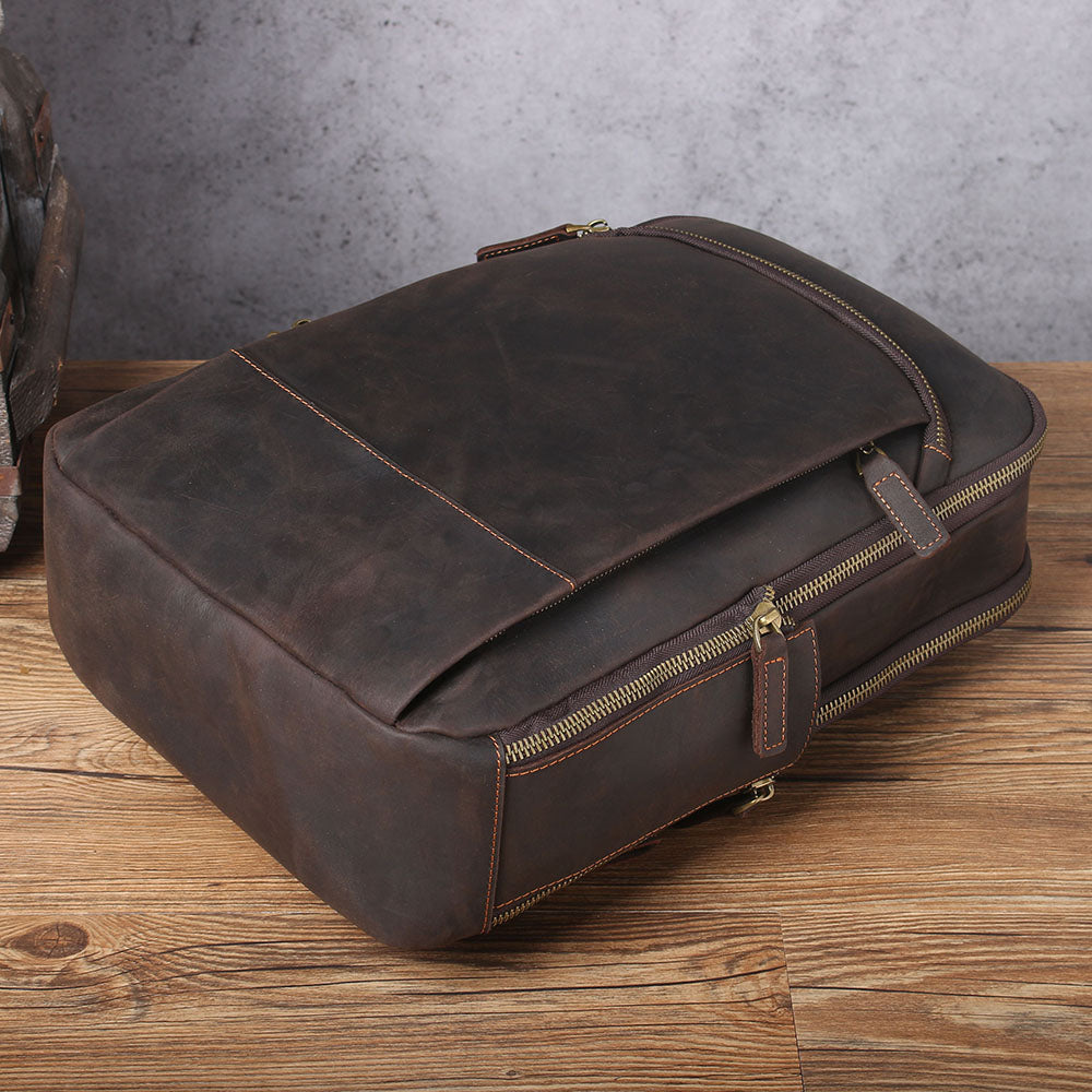 Leather Laptop Rucksack Loch Ness, dark brown, stylish design with zippers, perfect for casual or professional use.