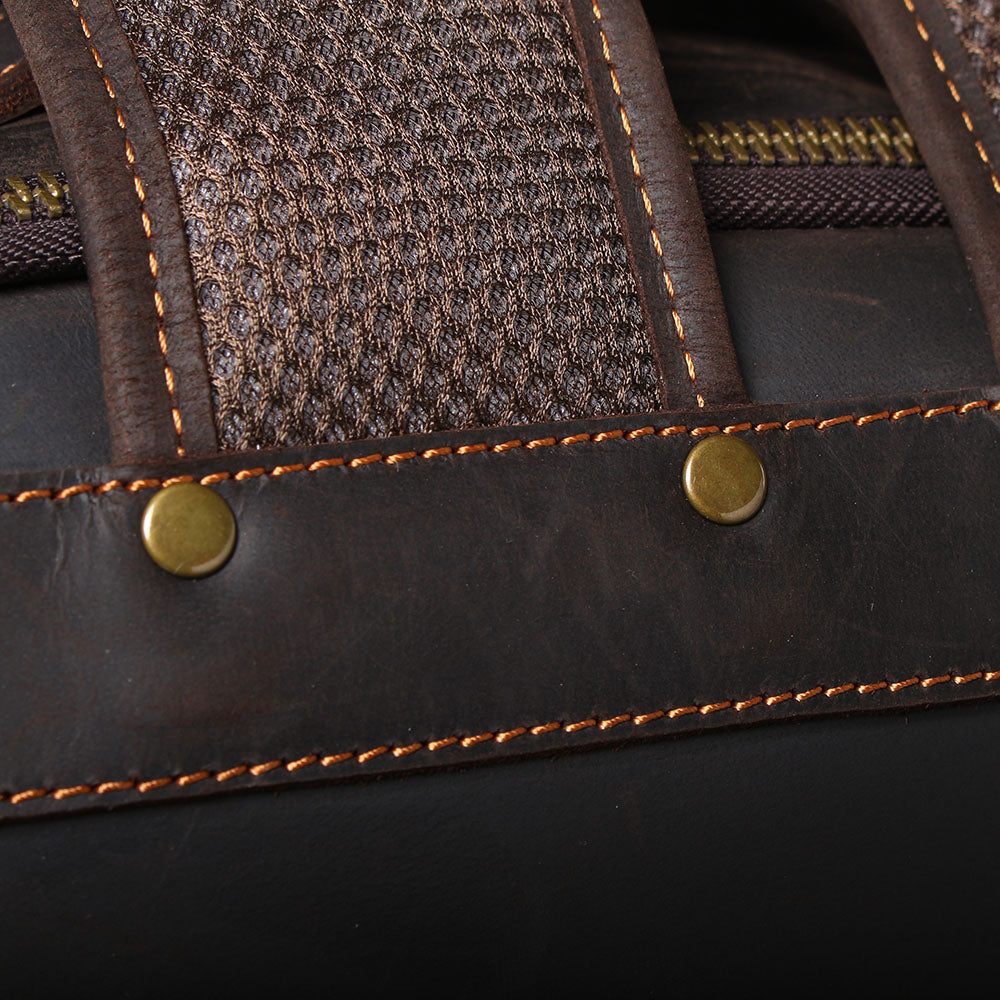 Close-up of the leather and fabric detailing on the Loch Ness leather laptop rucksack.