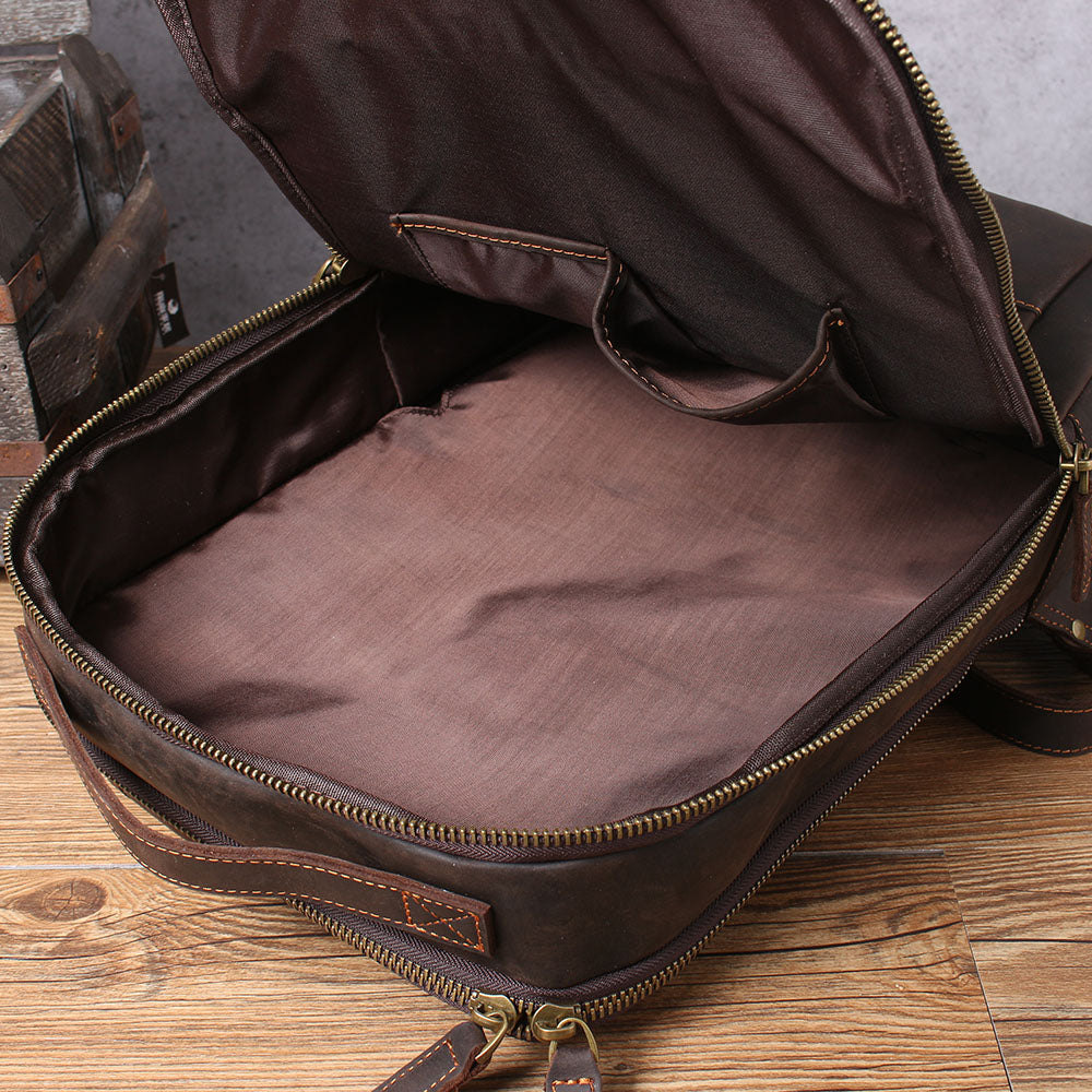 Interior view of the Loch Ness leather laptop rucksack, showcasing spacious compartments and a sleek design.
