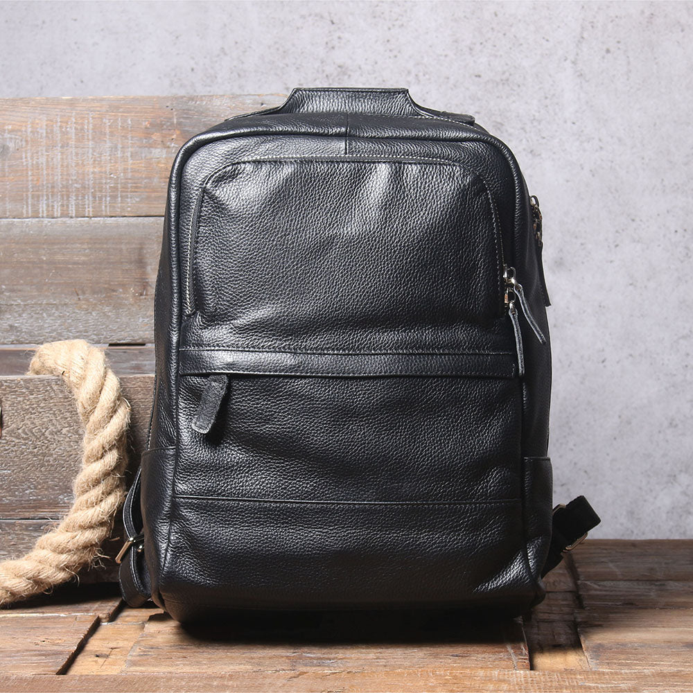 Stylish black leather bookbag from Death Valley, perfect for everyday use and travel, featuring multiple compartments.