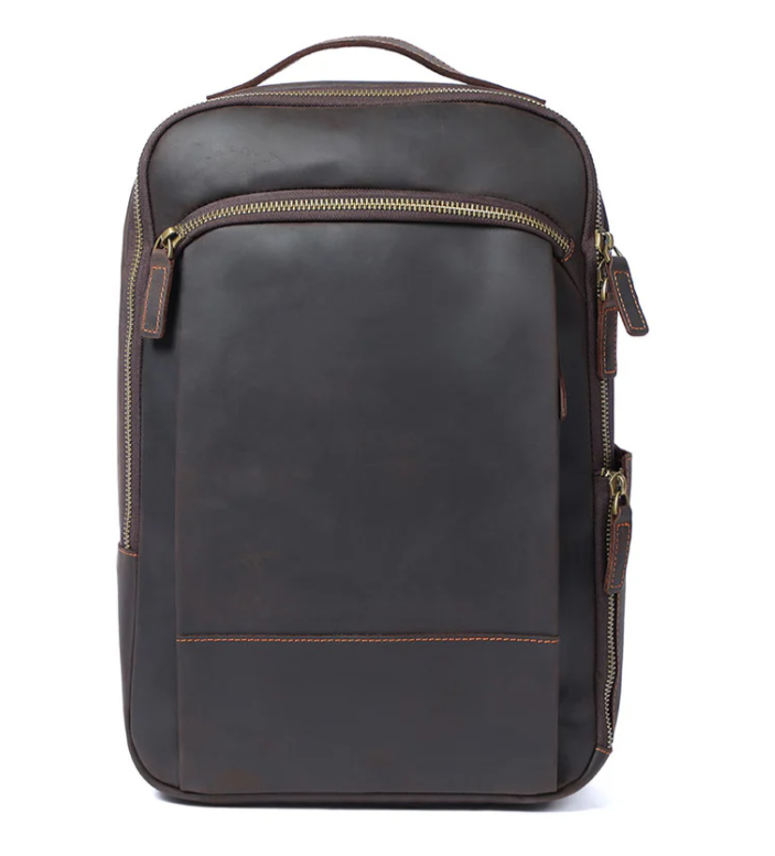 Leather laptop rucksack in dark brown designed for style and function, perfect for professionals and students.