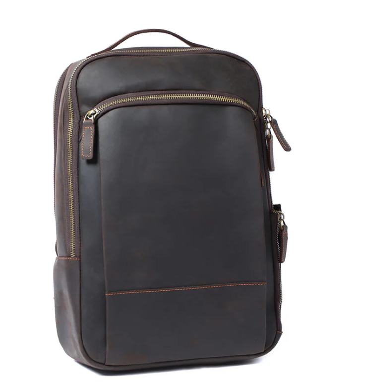 Stylish leather laptop rucksack in dark brown by Loch Ness with multiple zippered pockets.