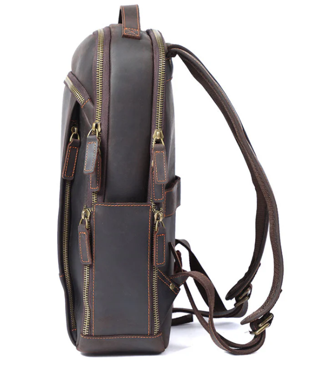 Side view of the Loch Ness leather laptop rucksack showcasing multiple zippers and a spacious design.