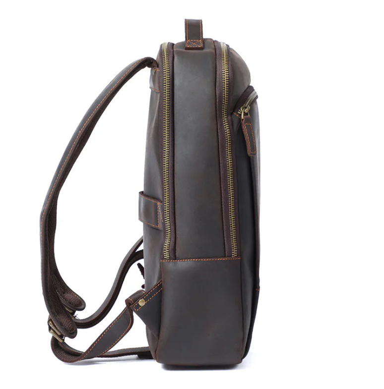 Side view of Loch Ness leather laptop rucksack showcasing its sleek design and durable zippers.