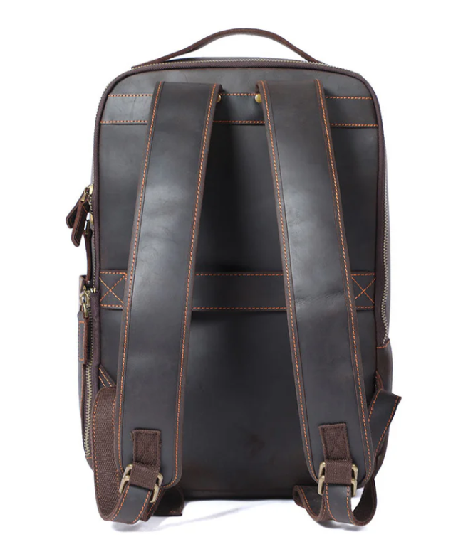 Back view of a brown leather laptop rucksack with adjustable straps, showcasing its sleek design.