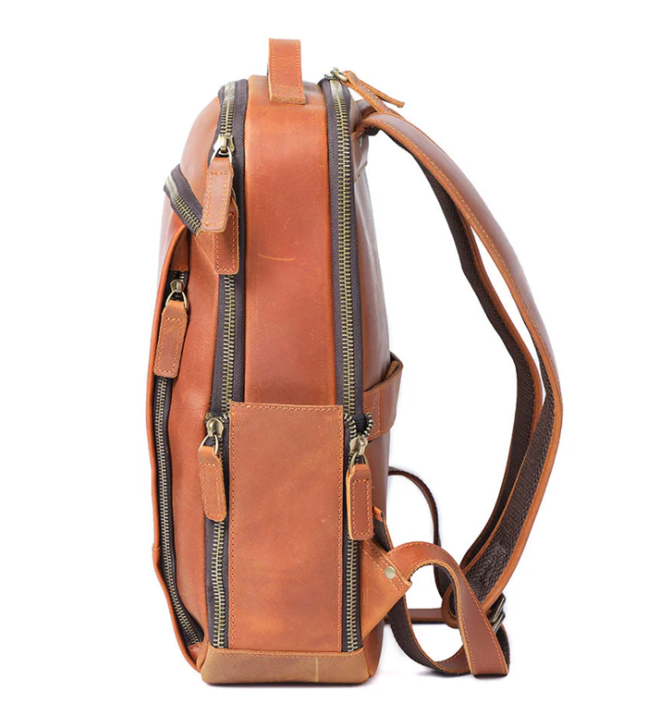 Side view of the Loch Ness leather laptop rucksack showing zippers and straps, ideal for stylish and durable travel.