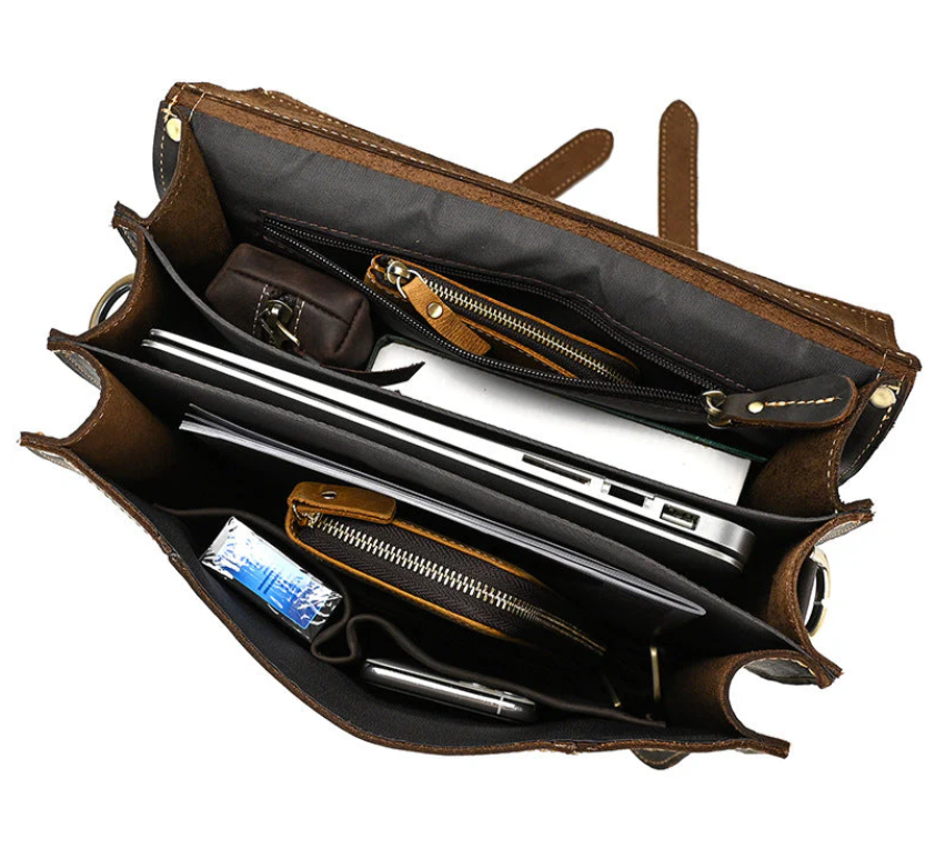 Interior view of a leather rucksack showcasing multiple compartments for organization, perfect for everyday use.