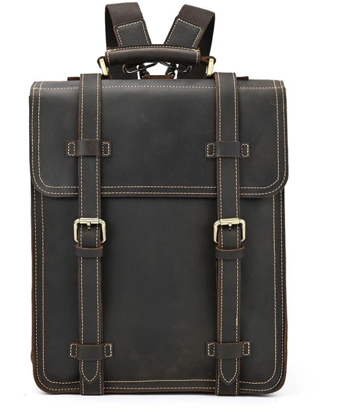 Stylish leather rucksack with two buckled straps and top handle, perfect for everyday use and outdoor adventures.
