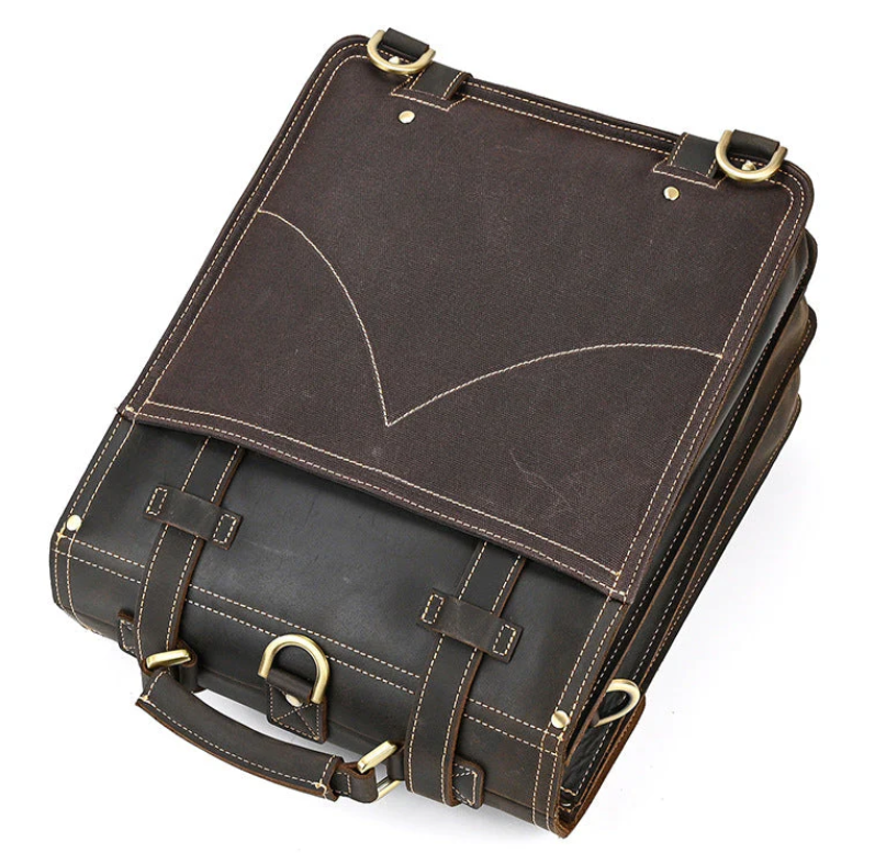 Stylish leather rucksack in dark brown with buckles and a flap, perfect for everyday use or travel.