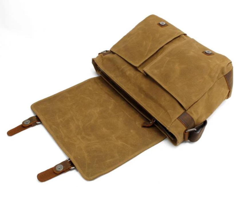 Retro shoulder bag by Yangtze, featuring a stylish design with dual front pockets and an open interior.