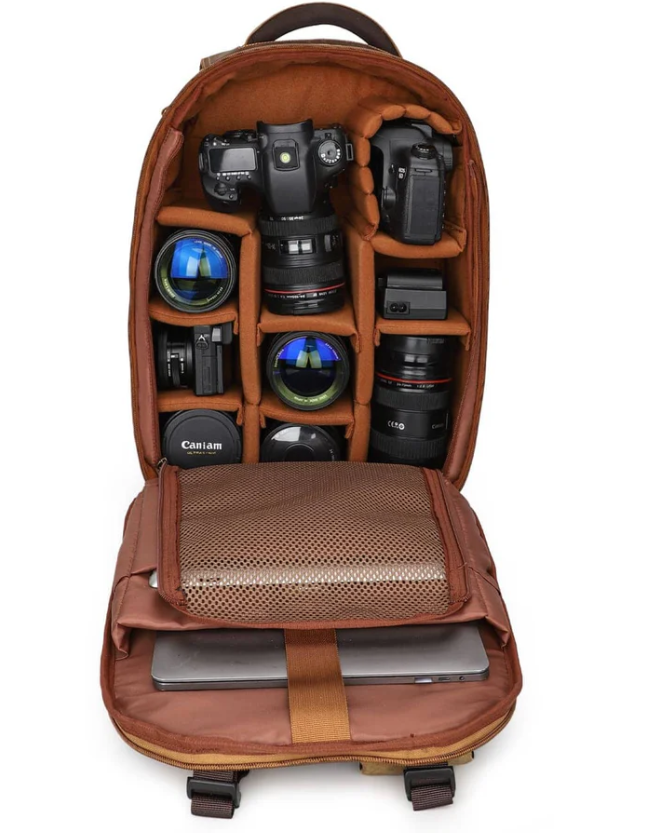 Interior view of the Vintage Camera Backpack showcasing organized camera gear and lenses for photography enthusiasts.