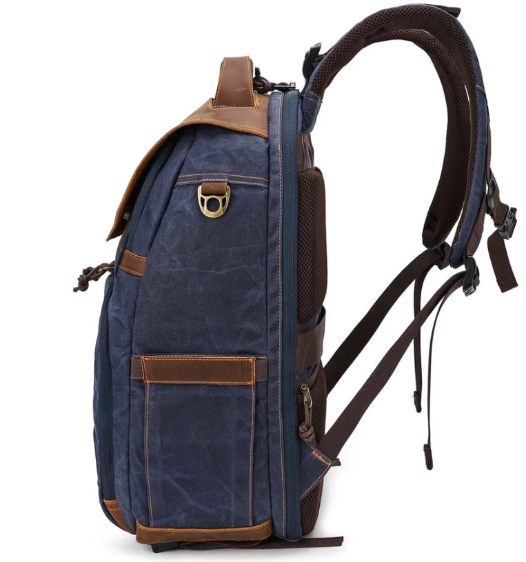 Vintage camera backpack in navy blue with leather accents and ergonomic design for photographers, Sierra Nevada style.