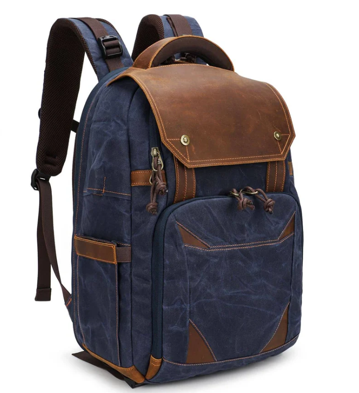 Vintage Sierra Nevada camera backpack with brown leather accents and a durable canvas exterior.