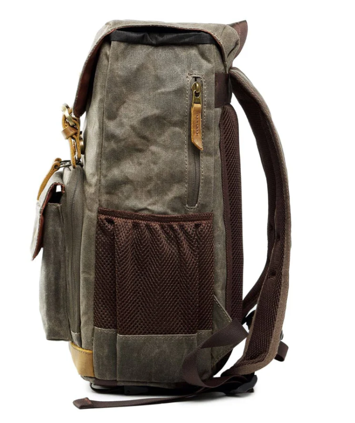 Waterproof canvas camera backpack in brown, featuring adjustable straps and multiple pockets for storage.