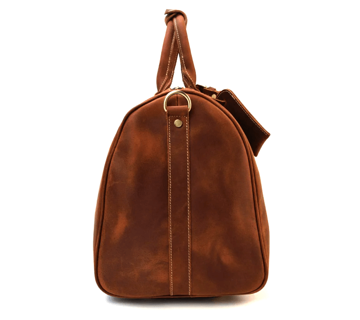 Stylish leather duffle bag in rich brown, perfect for travel with a sturdy handle for ease of use.