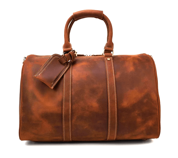 Stylish leather duffle bag in rich brown, perfect for travel and adventures inspired by the Himalayas.