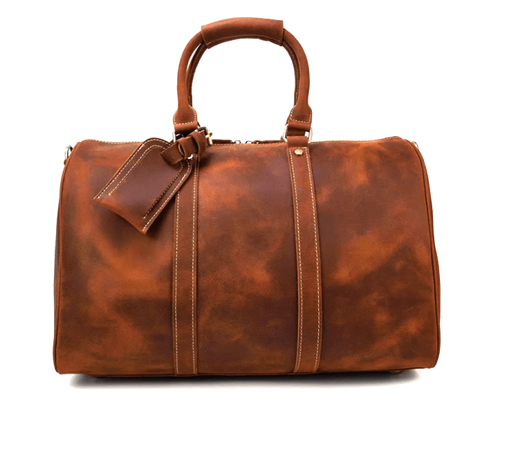 Stylish leather duffle bag in rich brown color, perfect for travel and outdoor adventures in the Himalayas.